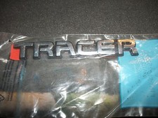 NOS 1991 1992 1993 MERCURY TRACER ORIGINAL TRUNK DECKLID REAR BODY PANEL EMBLEM