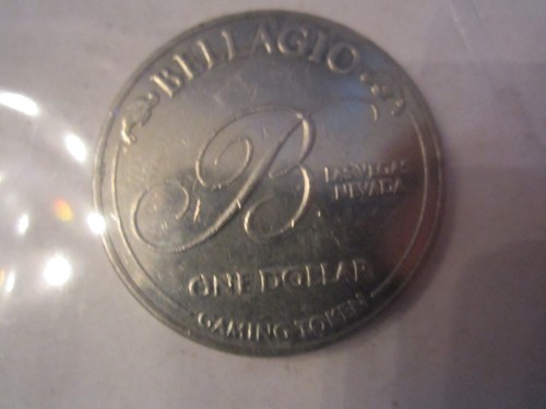 7 VINTAGE METAL CASINO SPIELCHIPS - EIN DOLLAR - CAESARS & BELLAGIO - Bild 2 von 8