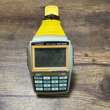 Casio DBC-32 Yellow Digital Watch 13-Language Multilingual Calculator Used