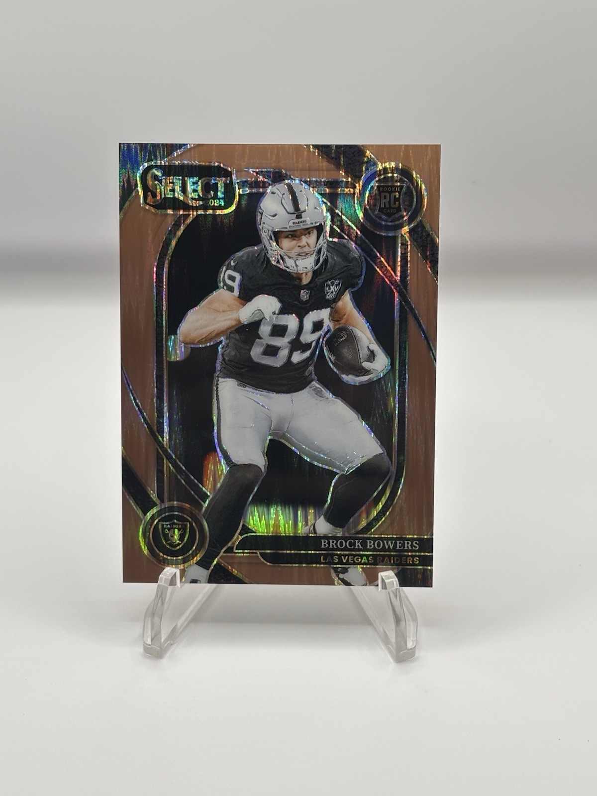 2024 Panini Select - Club Level Brock Bowers #222 Copper Shock Prizm /299 (RC)