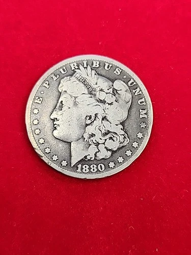 1880   **CC**   MORGAN SILVER DOLLAR *good Date