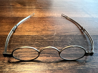 Antique Glasses with extendable arms and hard leather case. 19th C