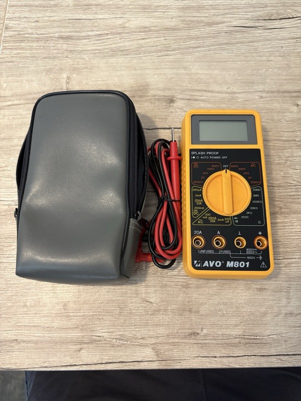 AVO M801 digital multimeter in a yellow splash-proof casing, With Test Leads