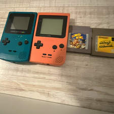 Nintendo Game Boy Color Handheld-System, 2 Konsolen Pink/Blau + 2 Spiele