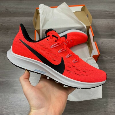 red nike running trainers