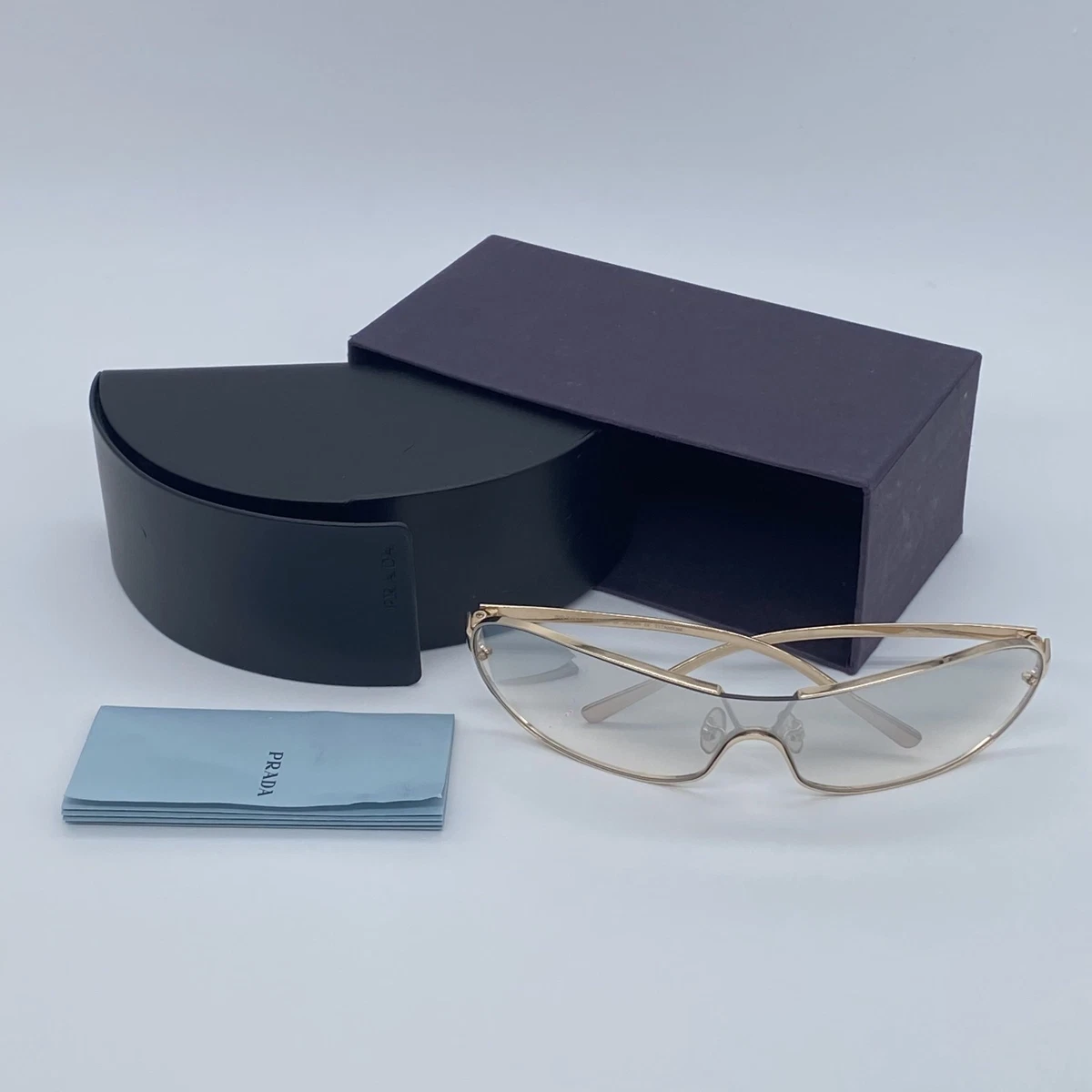 I’m selling these used Prada glasses. In great condition. Gently used Prada sunglasses for sale main image 2