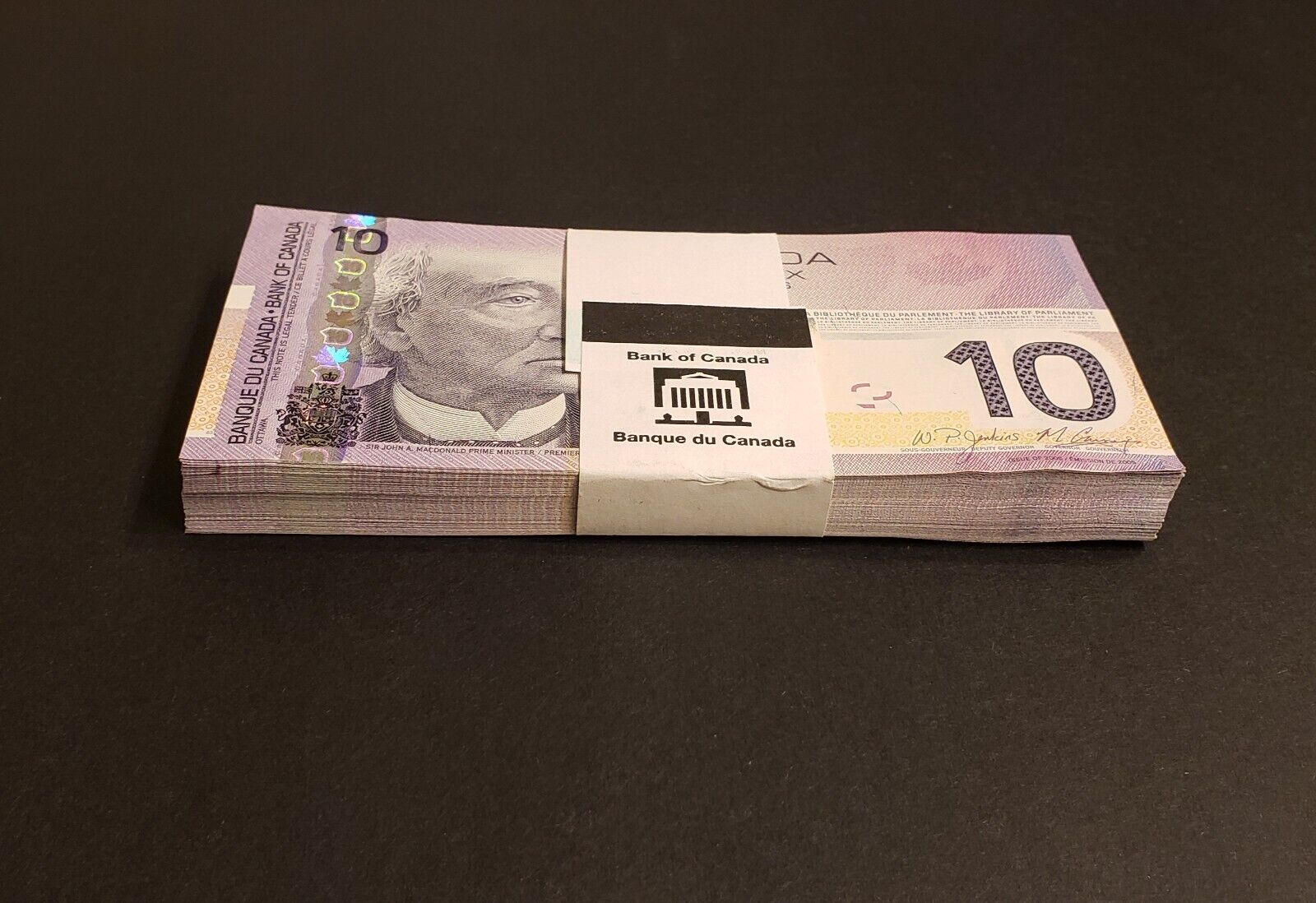 BUNDLE of 100 Consecutive 2005 Bank of Canada $10 Banknotes. "BFC" Prefix.
