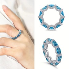 5ct Oval Cut Lab-Created Blue Topaz Full Eternity Wedding Band White Gold Plated