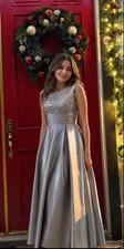 Long evening gown featuring a boned bodice.