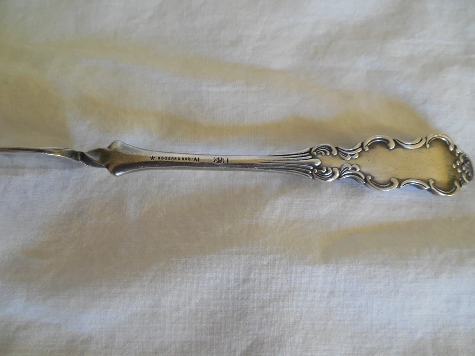 Cuchillo de mantequilla Rogers & bros I/S flamenco cubiertos de plata 1 pieza Foto 3 de 4