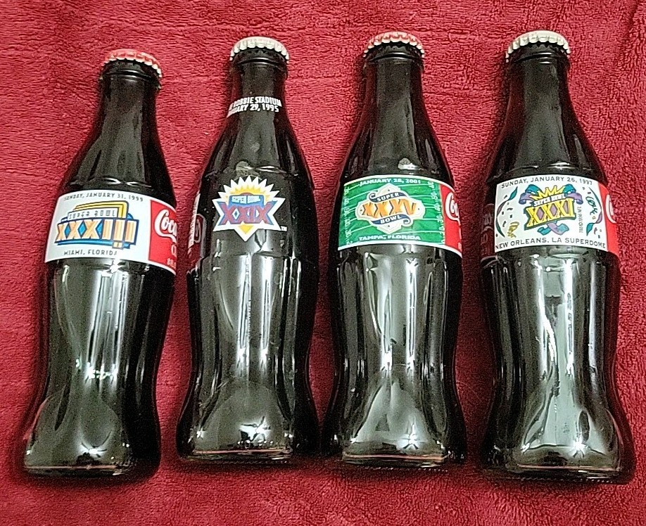 Lot of 4 Coca Cola limited edition commemorative Super Bowl bottles 95 97 99 01