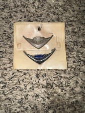 1955 Chevrolet Chevy Under Taillight Emblem Set Of 2