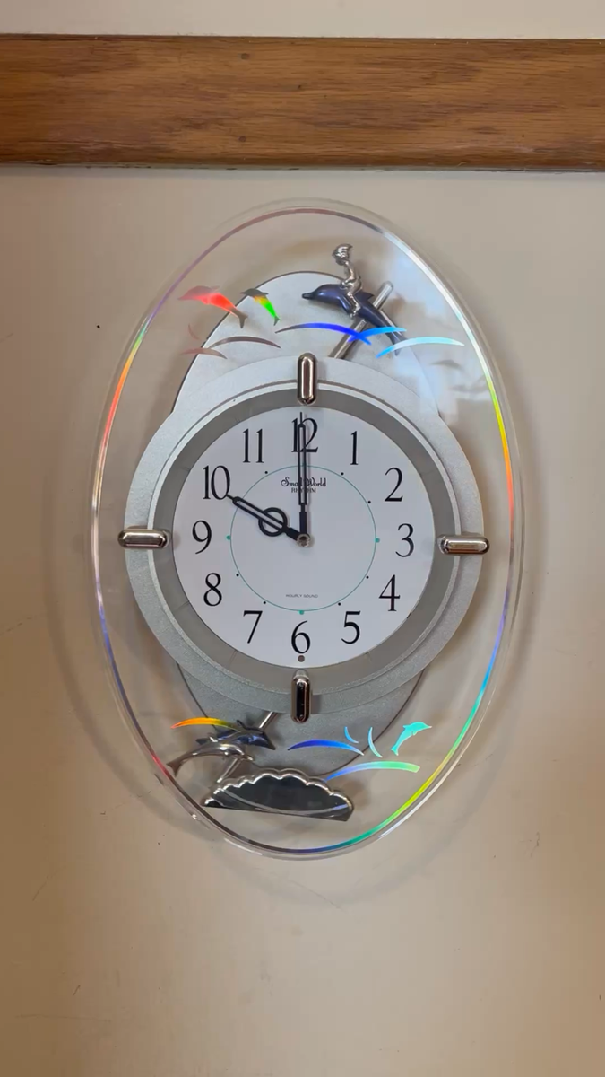 Vintage Small World Rhythm Magic Motion Wall Clock Dolphins
