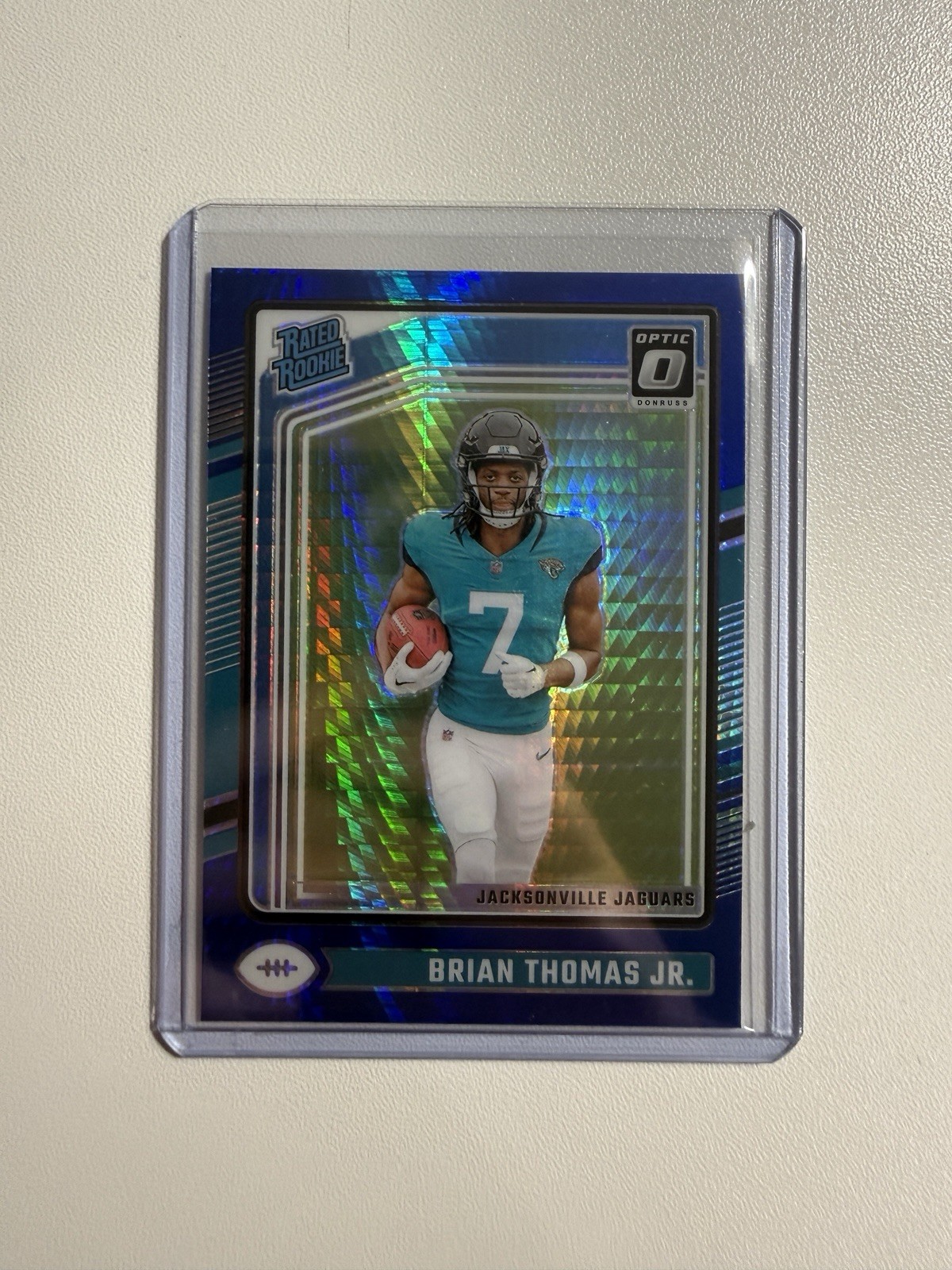 2024 Panini  Optic - Rated Rookie Brian Thomas Jr. #214 Blue Hyper Prizm (RC)