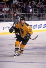Brian Rolston Boston Bruins shoots at an NHL game v the New - Ice Hockey Photo 1