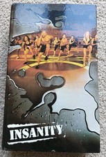 Insanity Total Body Workout - Original 10 Disc DVD Set with 3 Extra Workout DVDs