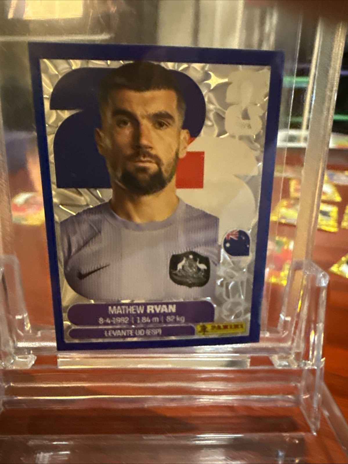 2026 Panini World Cup Sticker A Mathew Ryan Australia Blue Crumple - AUS2