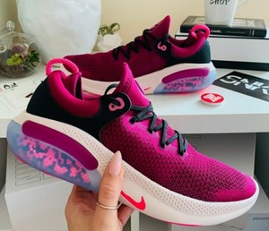 nike raspberry trainers