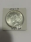 1927 P mint Peace Silver Dollar very good condition with sheen & details visible