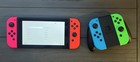 Nintendo Switch Bundle with Blue, Red, Orange and Pink Joy-Cons  (HAC-001-01)