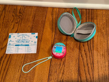 Tamagotchi Pix Party Confetti with Manual, Protective Case, and Wristlet