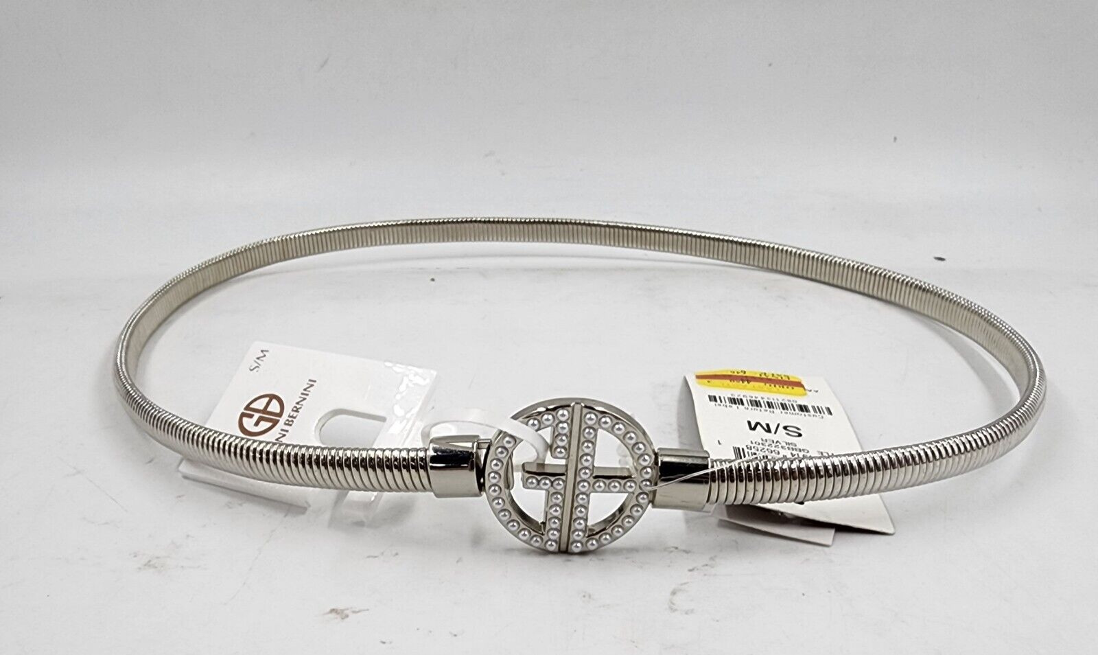 Женский эластичный металлический пояс с логотипом Giani Bernini, украшенный пряжкой S / M серебристого цвета