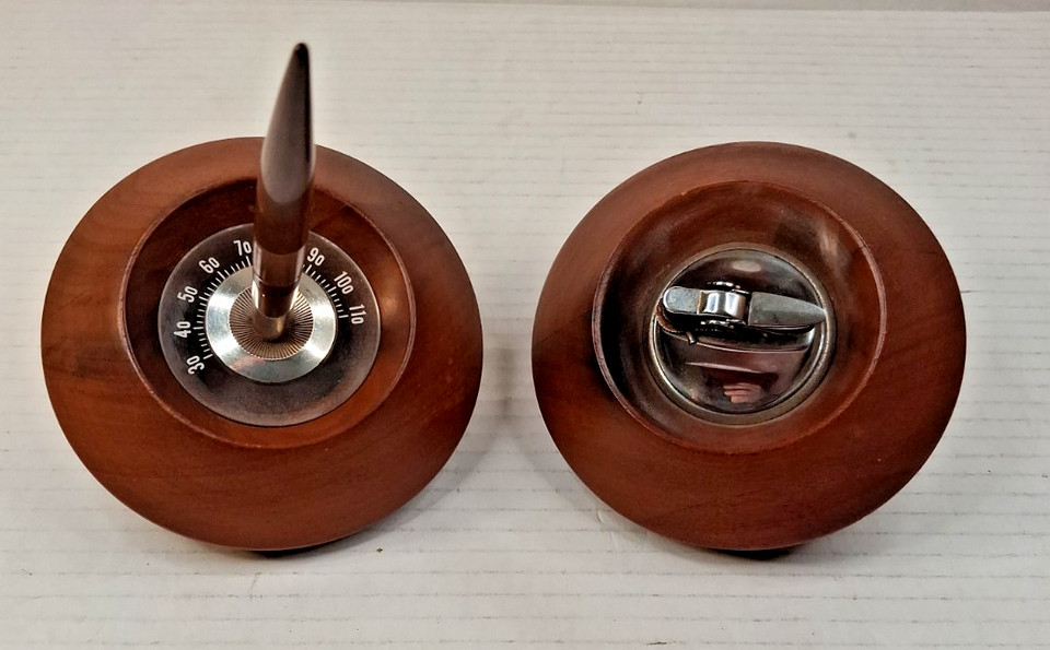 A Japanese MCM flying saucer–shaped desk set with a built-in lighter AND pen holder AND thermostat — peak atomic-age absurdity and genius all at once.