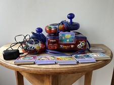 V tech Vsmile learning system  games.   For parts Only   Read description   