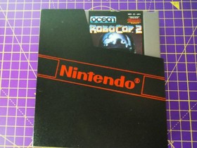 Cartucho de sistema de entretenimiento Robocop 2 NES Nintendo + funda antipolvo