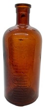 Rare Dark Amber Embossed Lysol Bottle. 1920-1929. 7.25" x 3".
