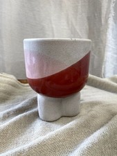 Ceramic plant pot. Beautiful, Pedestal, beige pot with pink & burgundy accent.