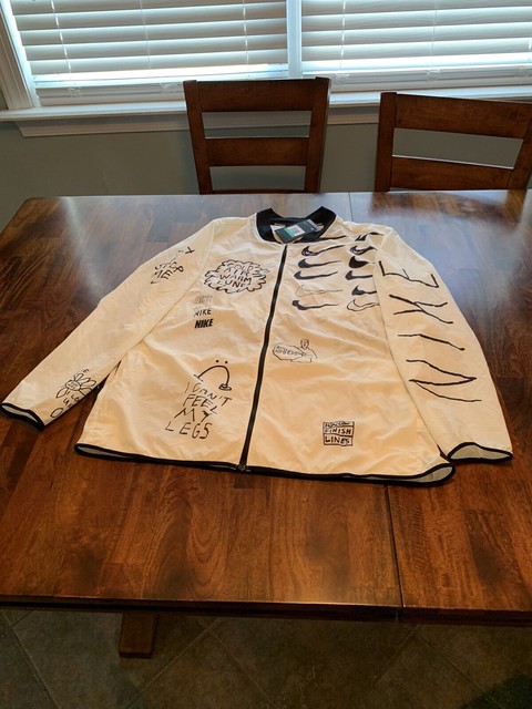 nike nathan bell running jacket