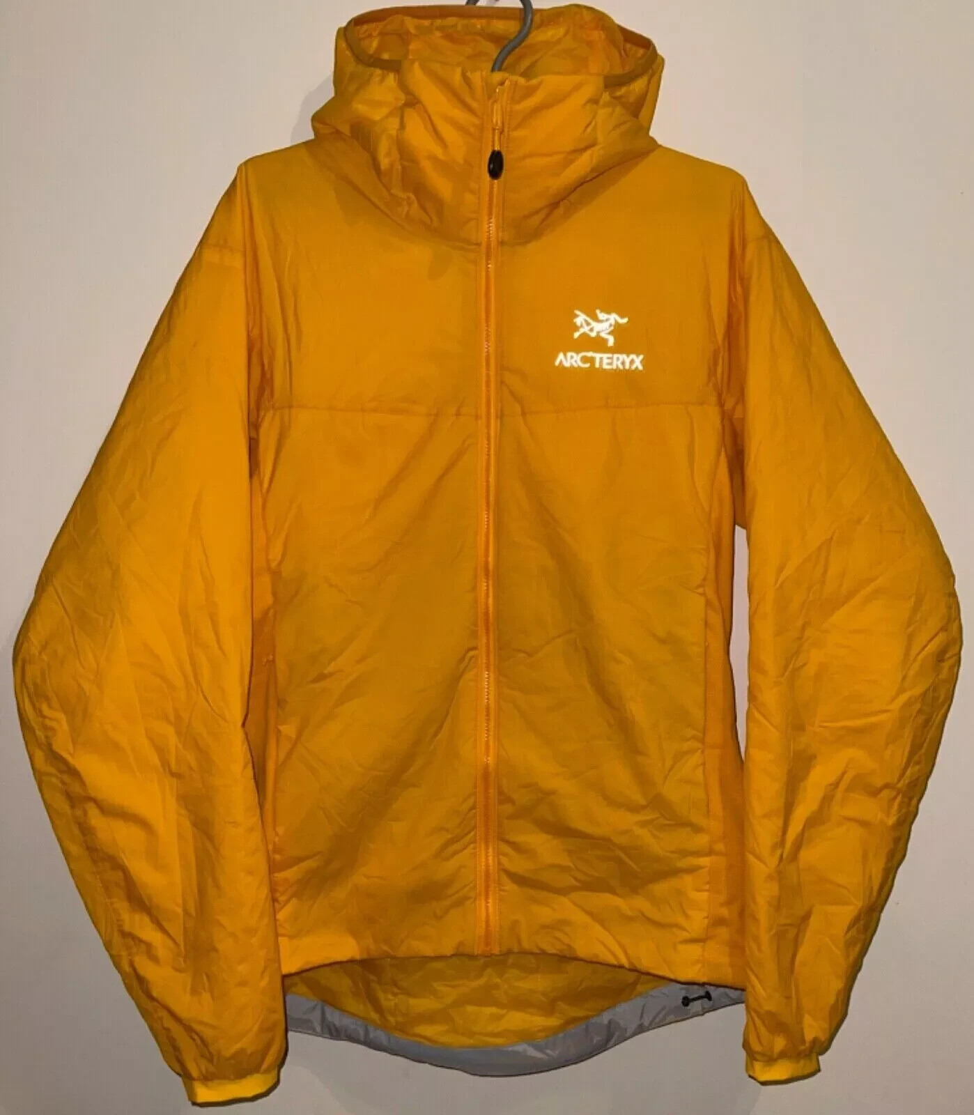ARC'TERYX ATOM LT GIACCA DA MONTAGNA CON CAPPUCCIO TYONO CORELOFT UOMO PICCOLO ZAFFERANO