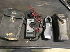 lot of 2 vintage voltmeters with cases amprob...