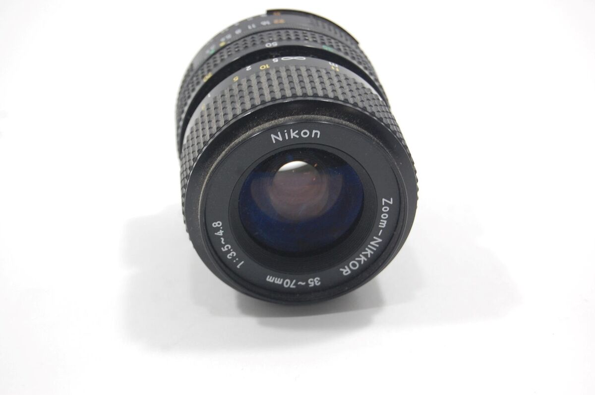 Read Nikon FM-10 SLR Camera with 35-70mm 1:5-4.8 Zoom Lens Read Nikon FM-10 SLR Camera with 35-70mm 1:5-4.8 Zoom Lens