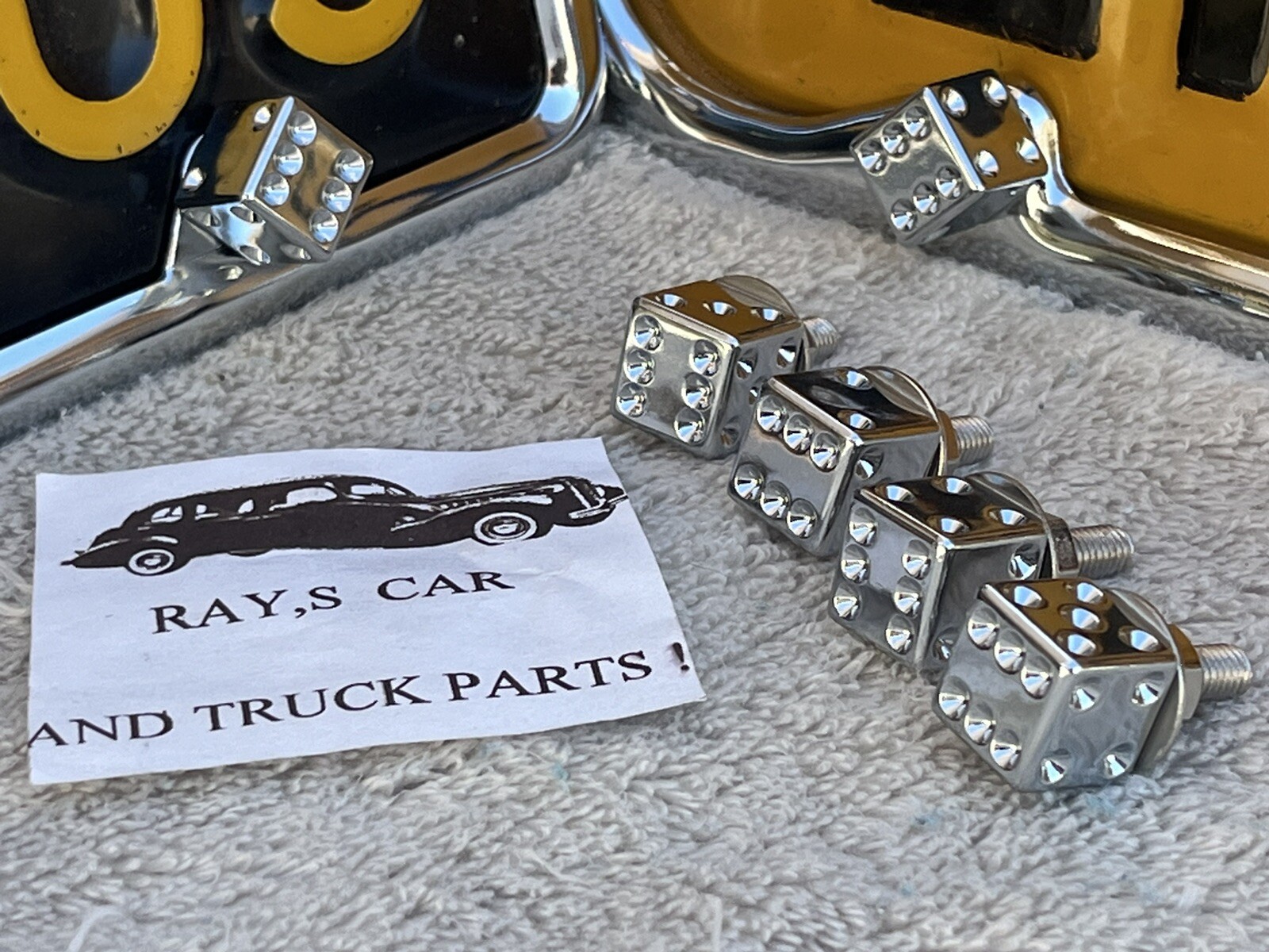 NEW SET OF 4  CHROME DICE LICENSE PLATE FASTENERS !