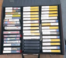  Commodre 64 games approx 80 including case- Classic titles good condition 