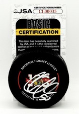 Corey Crawford signed Chicago Blackhawks 100th Anniversary Game Puck JSA