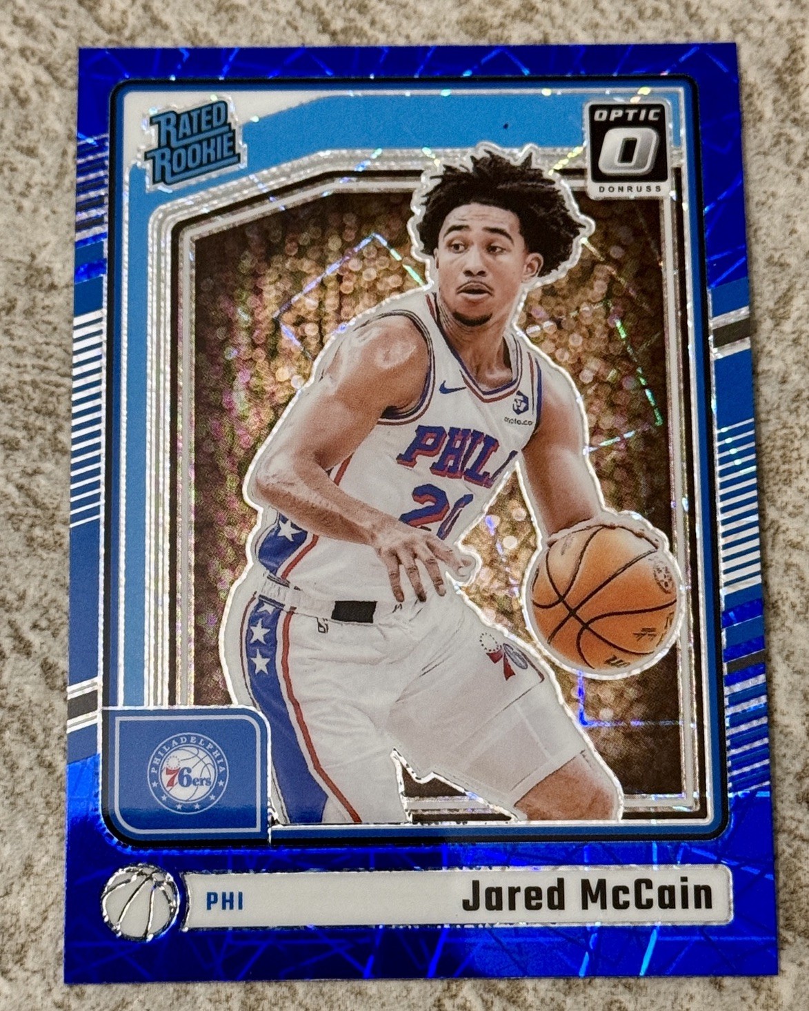 2024-25 Panini Donruss Optic Rated Rookie Jared McCain #270 Blue Velocity Prizm
