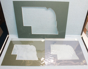 Three Nebraska Shaped Photo matts, 2 small and one large