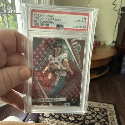 2023 Panini Phoenix - Trevor Lawrence #16 Red /199