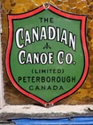 VINTAGE CANADIAN CANOE PORCELAIN SIGN OLD CANADA SPORTING GOODS BOATS LAKE RIVER