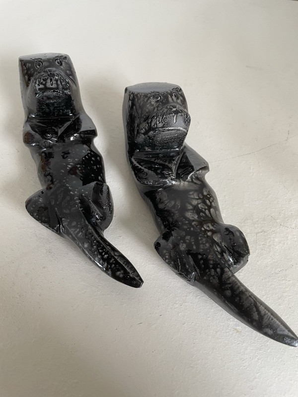 Two Handmade Cement Otter Figurines