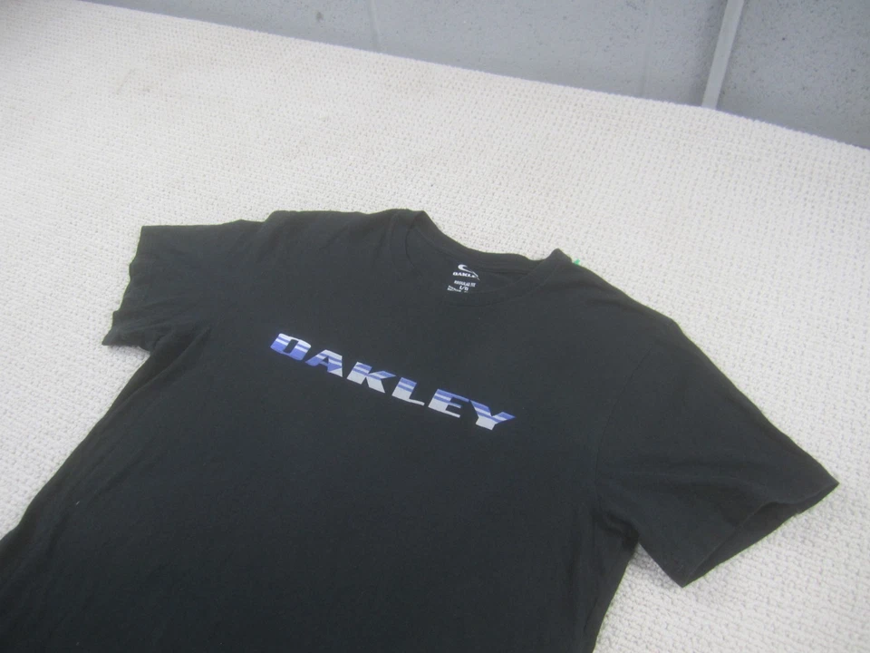 Camiseta deportiva Oakley para hombre grande negra con logotipo estampado gráfico cuello redondo Foto 2 de 4