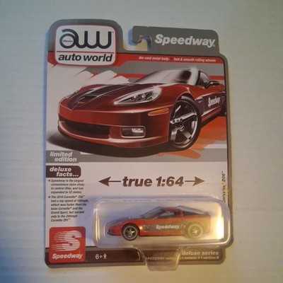 AUTO WORLD 1/64 SCALE SPEEDWAY 2010 CHEVY CORVETTE Z06  Gray on Red Version B