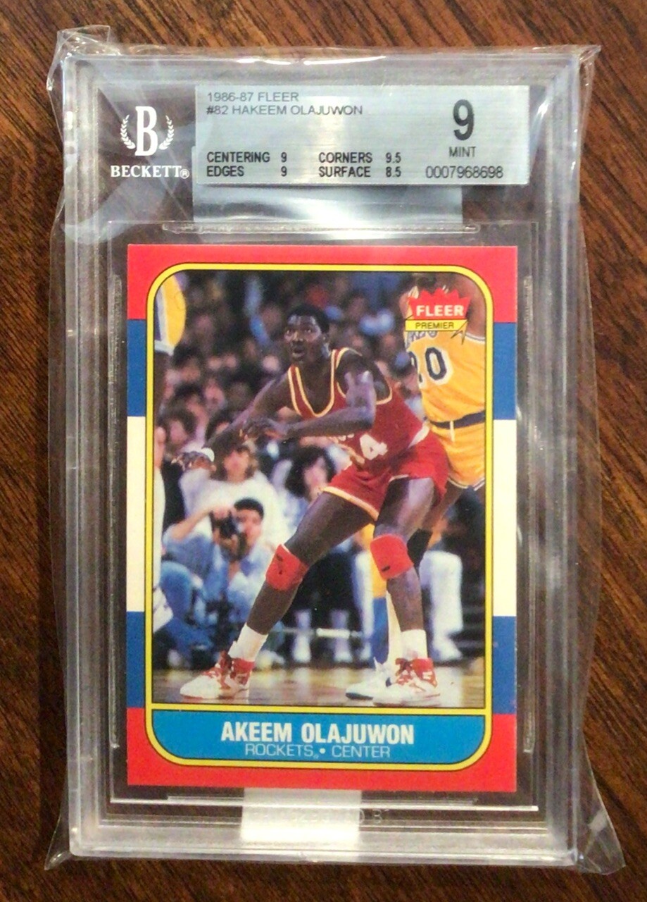 1986 FLEER BASKETBALL #82 AKEEM OLAJUWON RC BGS 9 MINT WITH 9.5 GEM MINT CORNERS