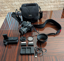 Canon EOS 2000D/Rebel T7 Digital SLR Camera  18-55mm Lens  Accessory Bundle