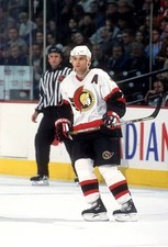 Curtis Leschyshyn Ottawa Senators skates on the ice at an NH- Ice Hockey Photo 3