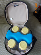 Medela Breast Milk Cooler / Transporter Bag with four 5 oz. Bottles and Ice Pack