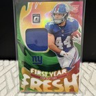 2025 Donruss Optic Football Neon Green Cam Skattebo #FYFBH-CSO